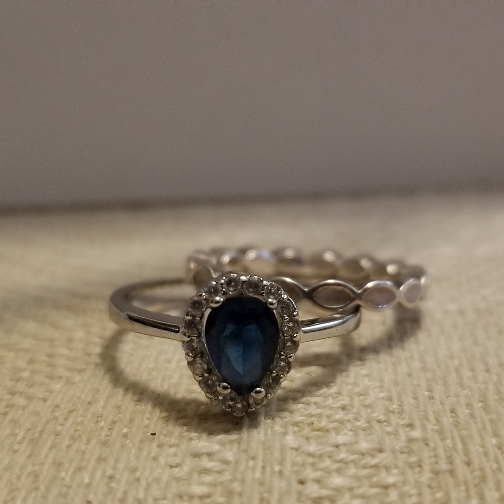 3 ring set, one of which is a Pandora ring